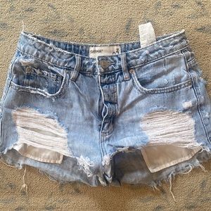 Distressed denim shorts